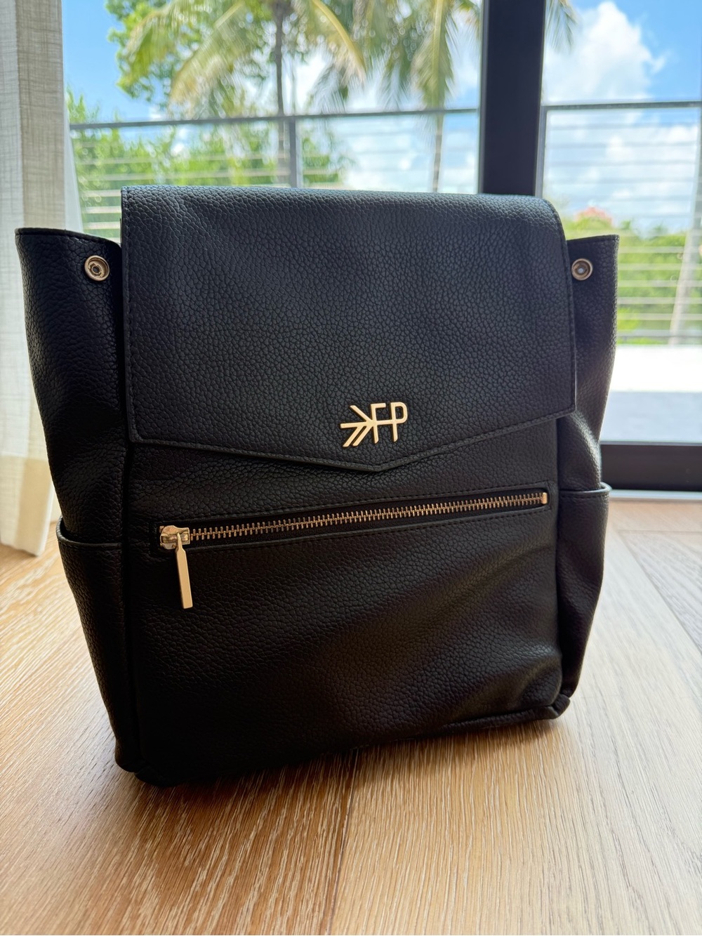 Freshly Picked Black Pebbled Leather Backpack with Gold Hardware